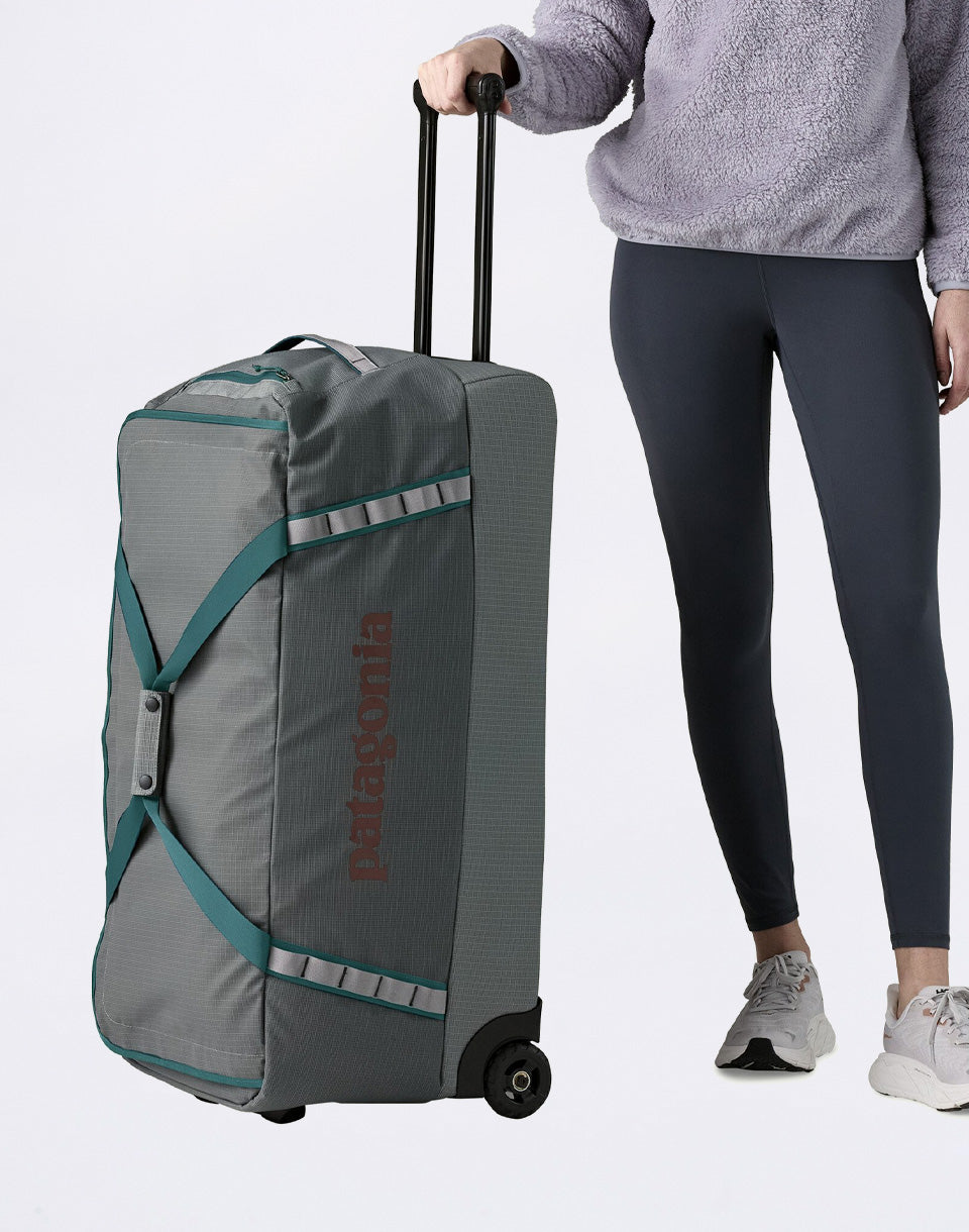 Black Hole Wheeled Duffel 100L