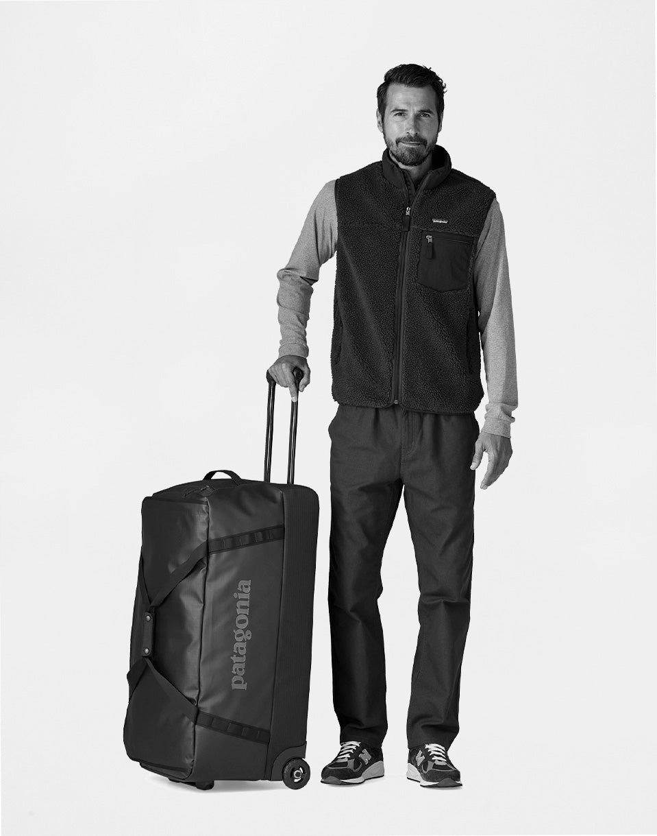 Black Hole Wheeled Duffel 100L