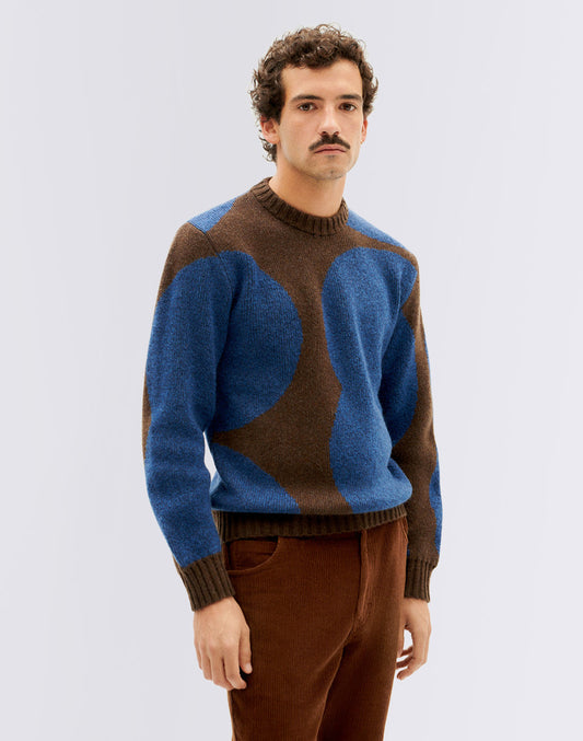 Stippen blauwe khem gebreide trui